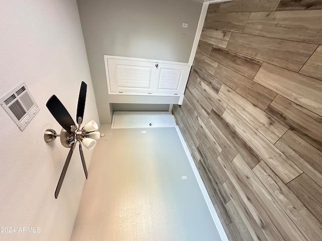 interior space featuring ceiling fan