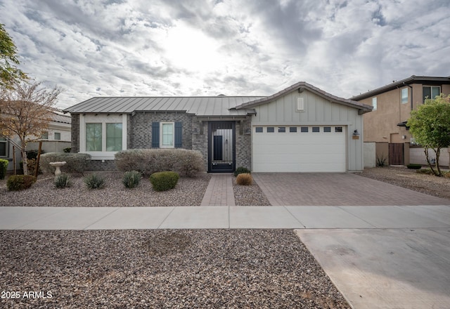 ranch-style home featuring a garage