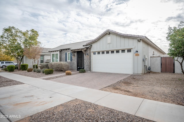 ranch-style house featuring a garage