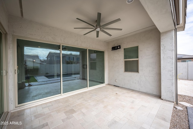 view of patio / terrace with ceiling fan