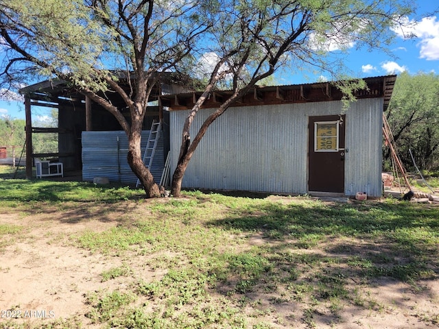 exterior space featuring an outdoor structure