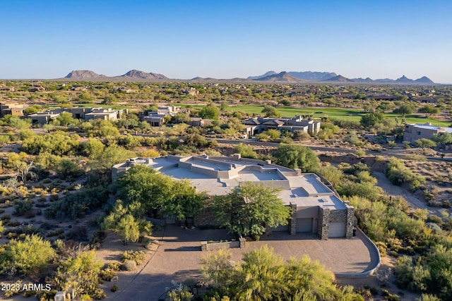 birds eye view of property featuring a mountain view