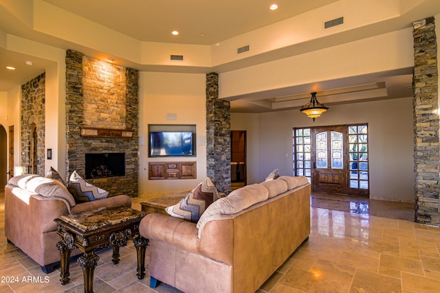 living room featuring a raised ceiling