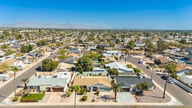 bird's eye view with a residential view and a mountain view