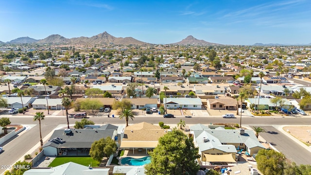 bird's eye view featuring a mountain view and a residential view