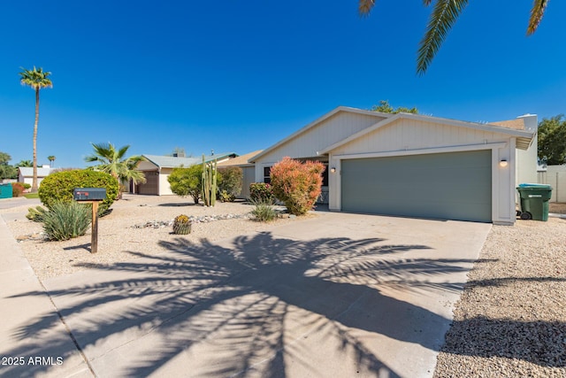 view of front of home featuring a garage and driveway