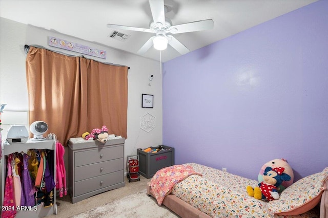 carpeted bedroom with ceiling fan and visible vents