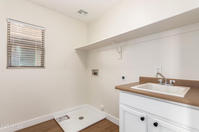 11891 N 147th Dr, Surprise, AZ 85379 - clothes washing area with a sink, visible vents, electric dryer hookup, baseboards, and hookup for a washing machine
