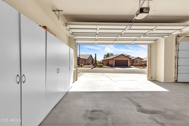 garage featuring a garage door opener