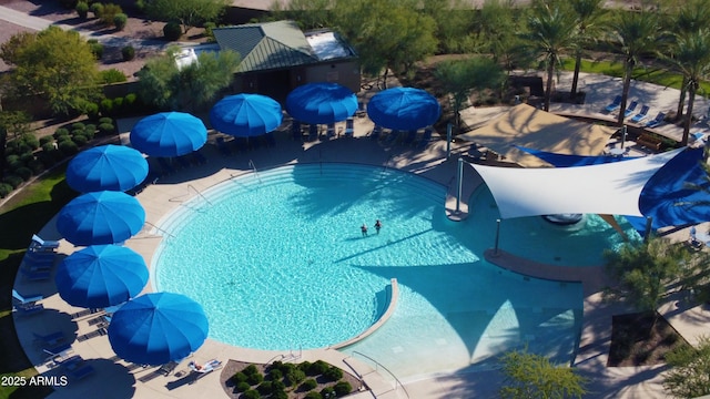 community pool with a patio area