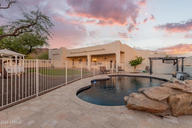 36382 N 35th St, Cave Creek, AZ 85331 - view of pool featuring a pergola, a patio area, a ceiling fan, fence, and a fenced in pool