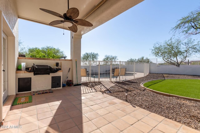 36382 N 35th St, Cave Creek, AZ 85331 - view of patio / terrace with a fenced backyard, ceiling fan, and exterior kitchen