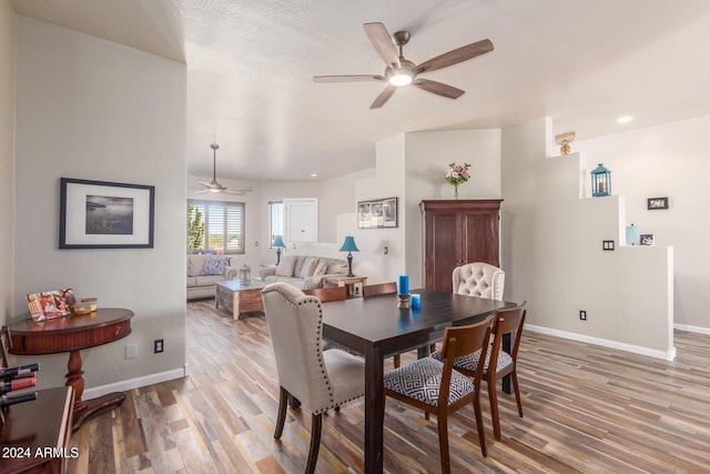 36382 N 35th St, Cave Creek, AZ 85331 - dining area with light wood finished floors, a ceiling fan, and baseboards