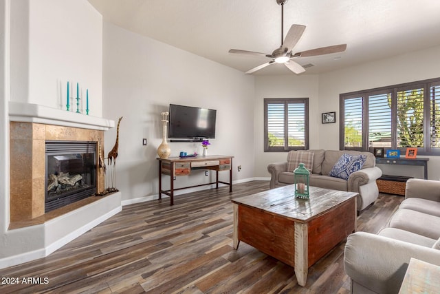 36382 N 35th St, Cave Creek, AZ 85331 - living room with a tile fireplace, wood finished floors, visible vents, a ceiling fan, and baseboards