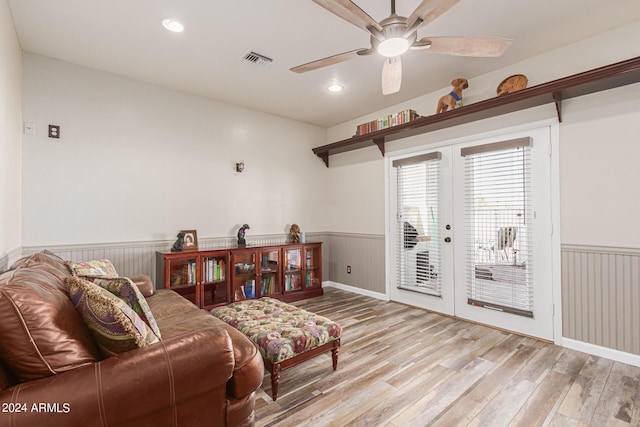 36382 N 35th St, Cave Creek, AZ 85331 - living room with french doors, a wainscoted wall, light wood-type flooring, visible vents, and ceiling fan