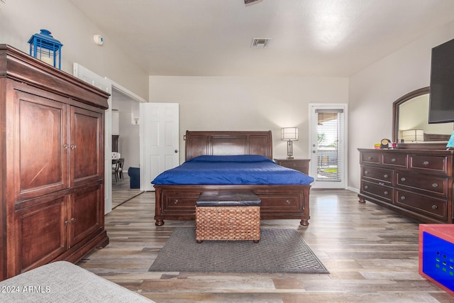 36382 N 35th St, Cave Creek, AZ 85331 - bedroom with light wood-style flooring, visible vents, and access to exterior