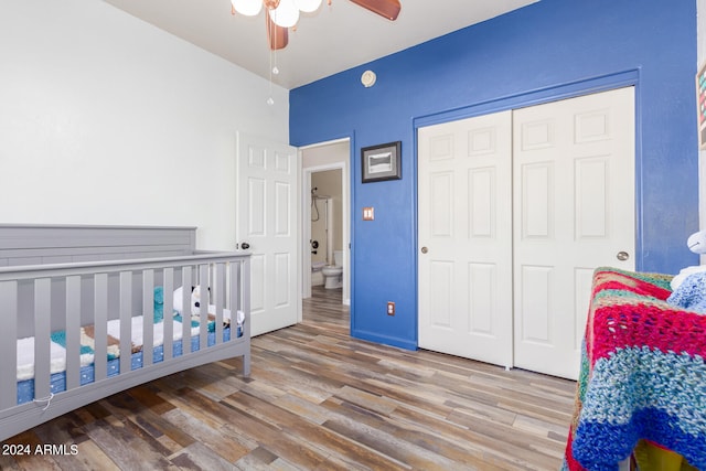 bedroom with wood-type flooring, a closet, and ceiling fan