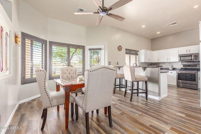 36382 N 35th St, Cave Creek, AZ 85331 - dining room featuring recessed lighting, light wood-style floors, visible vents, and baseboards