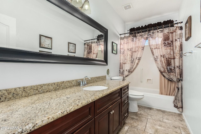 full bathroom with shower / bath combo, toilet, and vanity