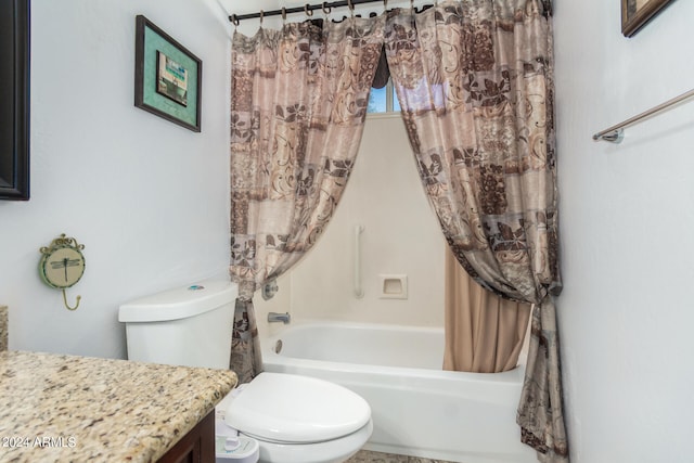 full bathroom featuring vanity, toilet, and shower / tub combo with curtain