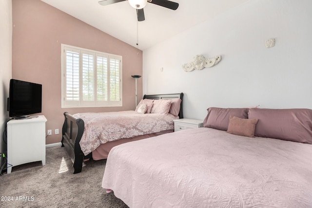 carpeted bedroom featuring vaulted ceiling and ceiling fan