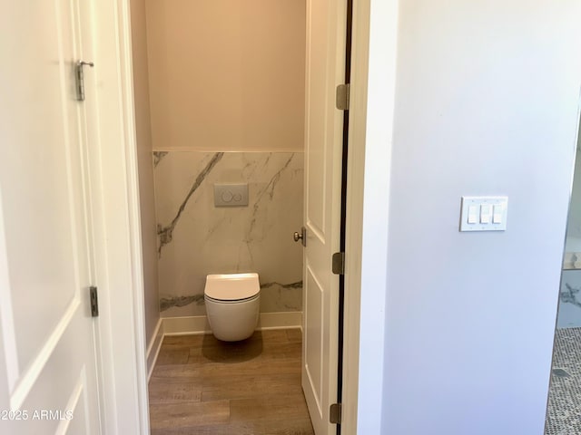 3021 N 47th St, Phoenix, AZ 85018 - bathroom with wood finished floors and toilet