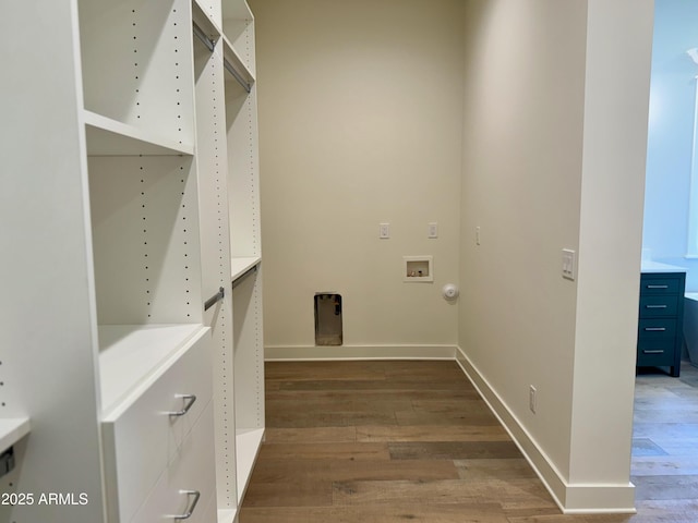 3021 N 47th St, Phoenix, AZ 85018 - washroom featuring wood finished floors and washer hookup