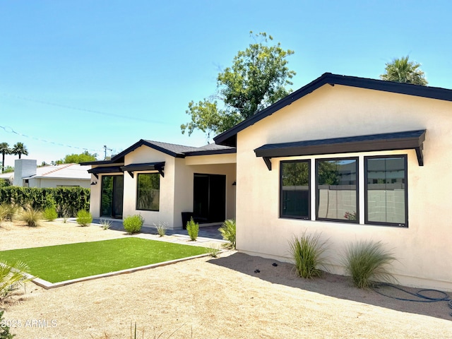 3021 N 47th St, Phoenix, AZ 85018 - view of front of house featuring stucco siding