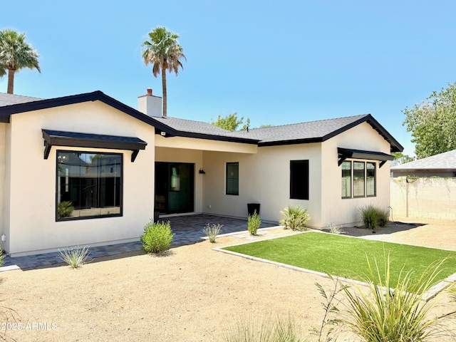 3021 N 47th St, Phoenix, AZ 85018 - rear view of property with stucco siding, a patio area, and roof with shingles