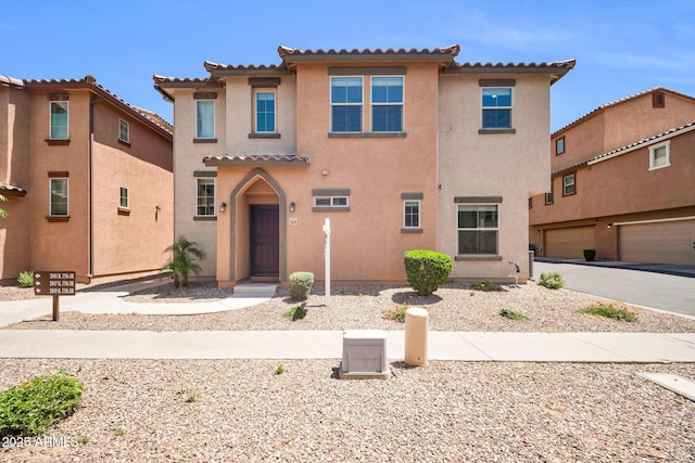 2049 N 77th Dr, Phoenix, AZ 85035 - mediterranean / spanish-style home with stucco siding and a tiled roof
