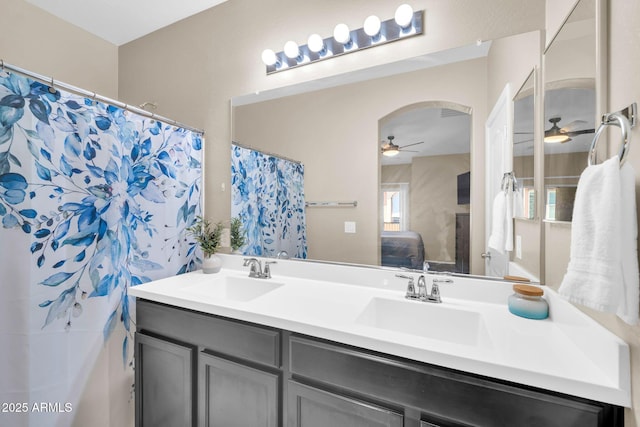 2049 N 77th Dr, Phoenix, AZ 85035 - ensuite bathroom with double vanity, a sink, a ceiling fan, and ensuite bath