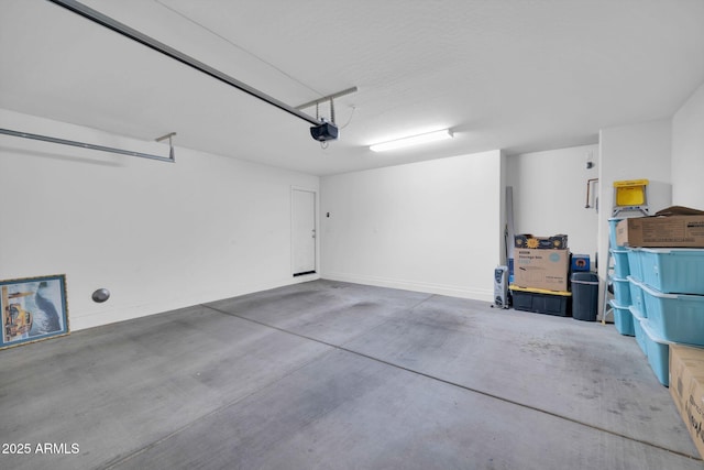 2049 N 77th Dr, Phoenix, AZ 85035 - garage featuring a garage door opener