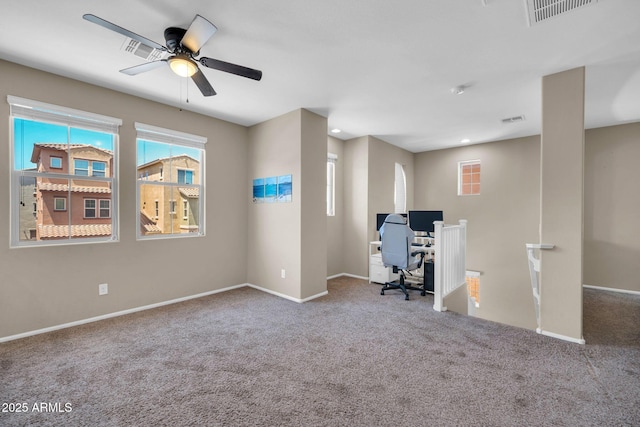 2049 N 77th Dr, Phoenix, AZ 85035 - unfurnished office featuring plenty of natural light, carpet flooring, and visible vents