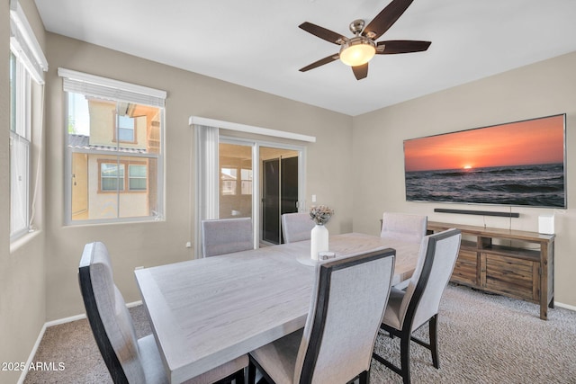2049 N 77th Dr, Phoenix, AZ 85035 - carpeted dining space with baseboards and ceiling fan