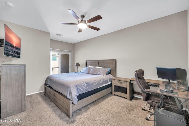 2049 N 77th Dr, Phoenix, AZ 85035 - bedroom with baseboards, light carpet, a ceiling fan, and visible vents