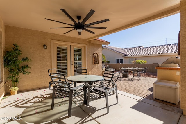 view of patio / terrace featuring ceiling fan