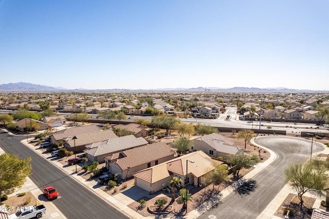 birds eye view of property featuring a mountain view