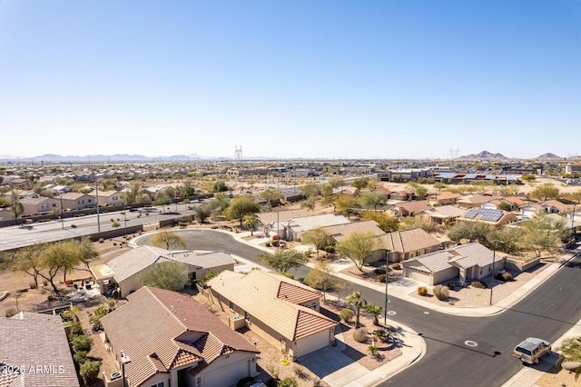 birds eye view of property featuring a mountain view