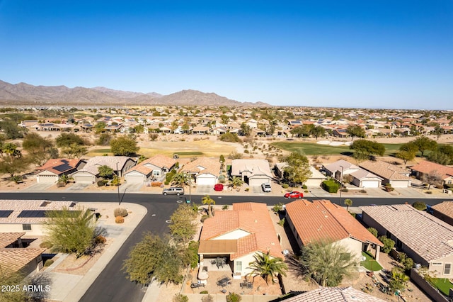 drone / aerial view featuring a mountain view