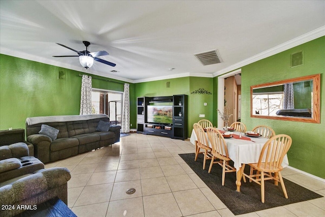 tiled living room with crown molding and ceiling fan