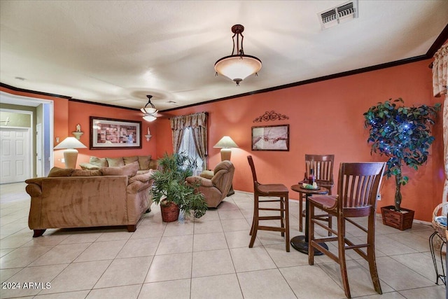 living room featuring light tile patterned floors and ornamental molding