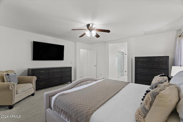 bedroom with light colored carpet and ceiling fan