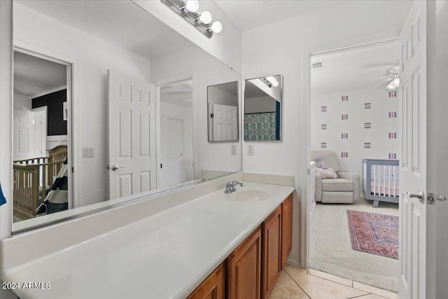 bathroom featuring vanity, tile patterned floors, and ceiling fan