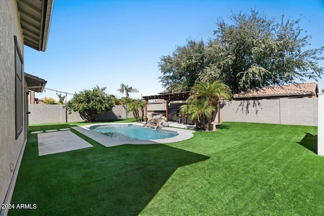 view of yard featuring a patio and a fenced in pool