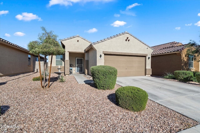 1601 S 215th Dr, Buckeye, AZ 85326 - mediterranean / spanish home with a tiled roof, a garage, driveway, and stucco siding