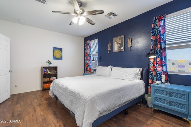 1601 S 215th Dr, Buckeye, AZ 85326 - bedroom with wood finished floors, a ceiling fan, and baseboards