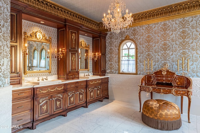 bathroom with a chandelier, a textured ceiling, vanity, and crown molding