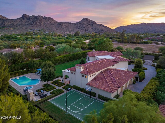 aerial view at dusk with a mountain view