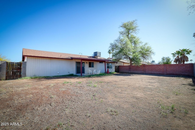 3209 W Charleston Ave, Phoenix, AZ 85053 - back of house with fence and central AC unit