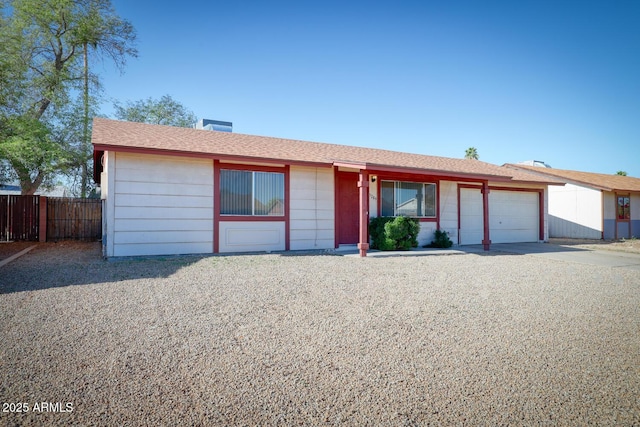 3209 W Charleston Ave, Phoenix, AZ 85053 - ranch-style home featuring fence, concrete driveway, and an attached garage